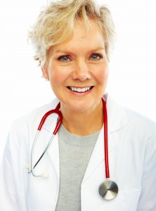 Happy old female doctor isolated over white background